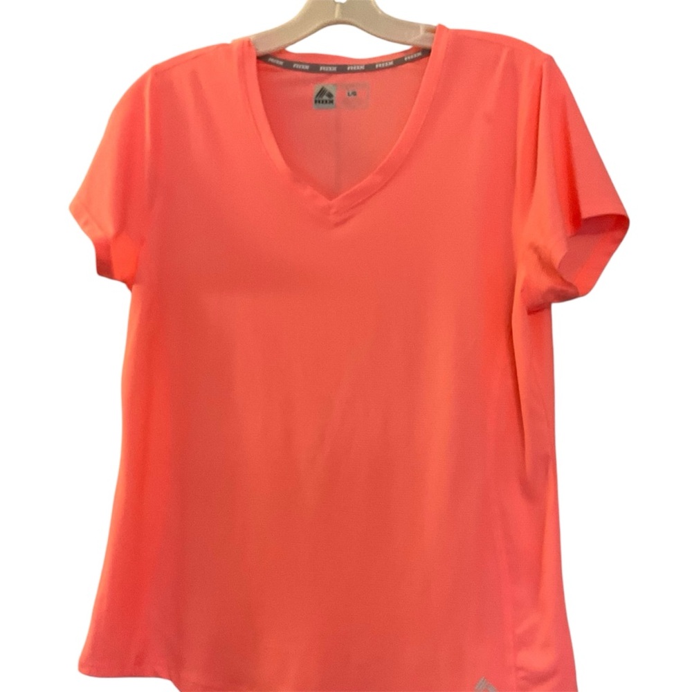 Short sleeve athletic top in excellent pre owned condition.